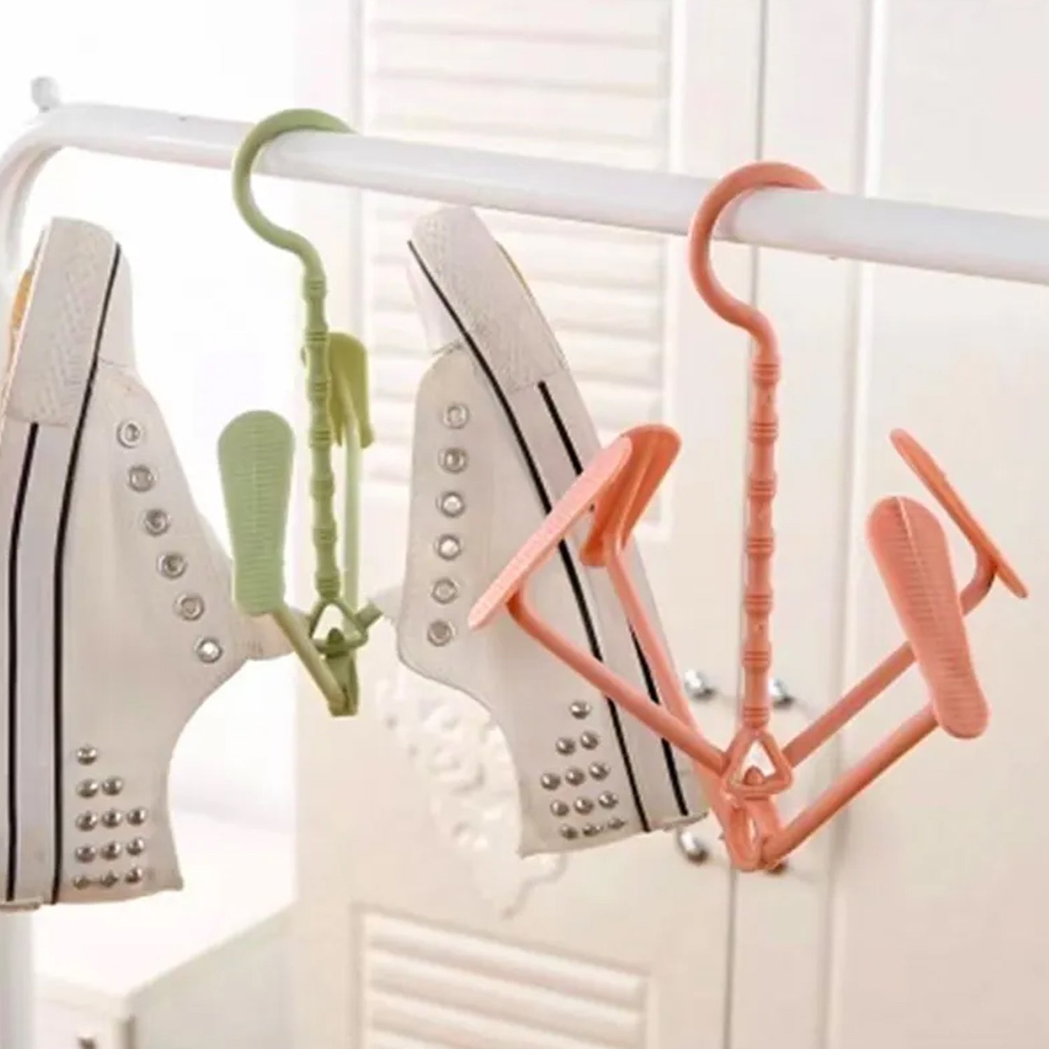 Drying shoe rack with rotating hooks, dual-use for wet and dry shoes.