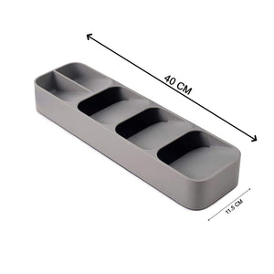 Cutlery tray box shown with a variety of utensils organized in slots