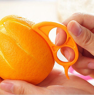 Ring-shaped peeler, snail design for oranges.