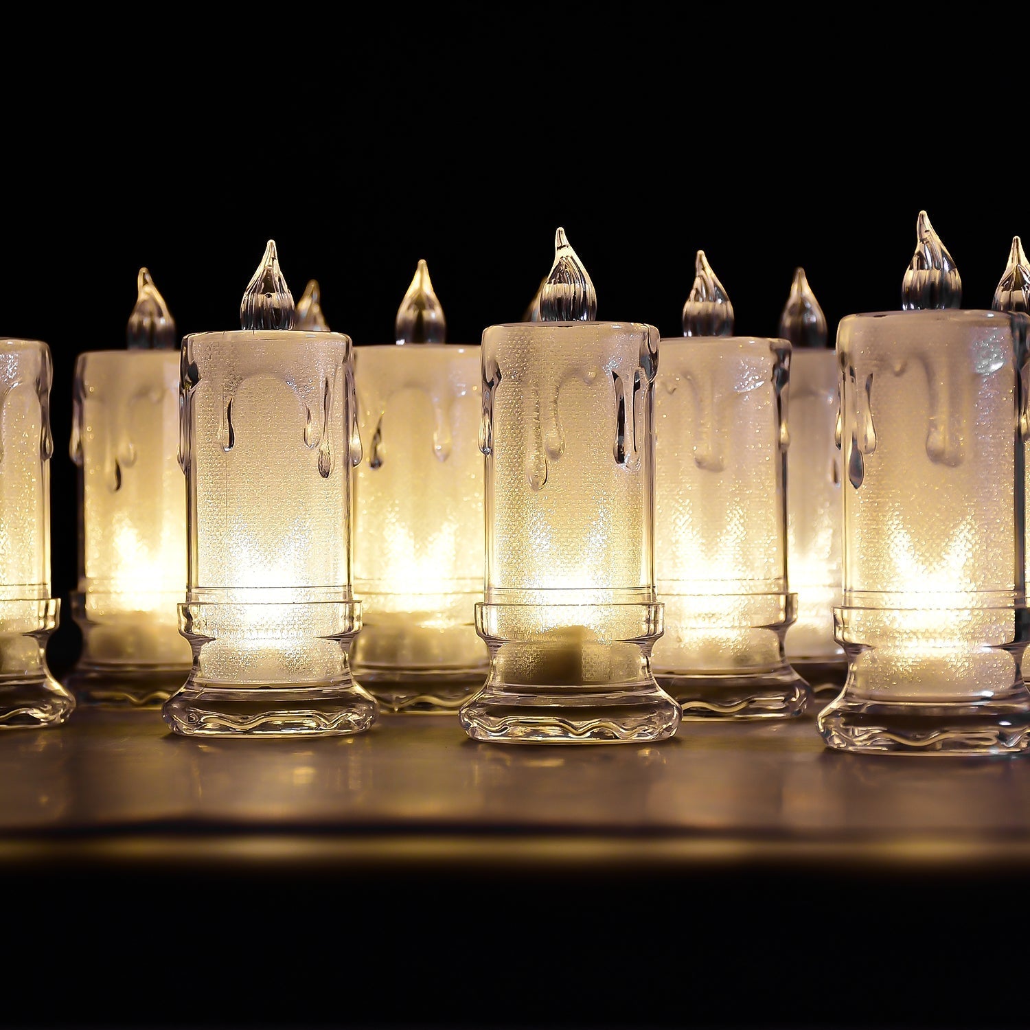 Group of melted design flameless candles.