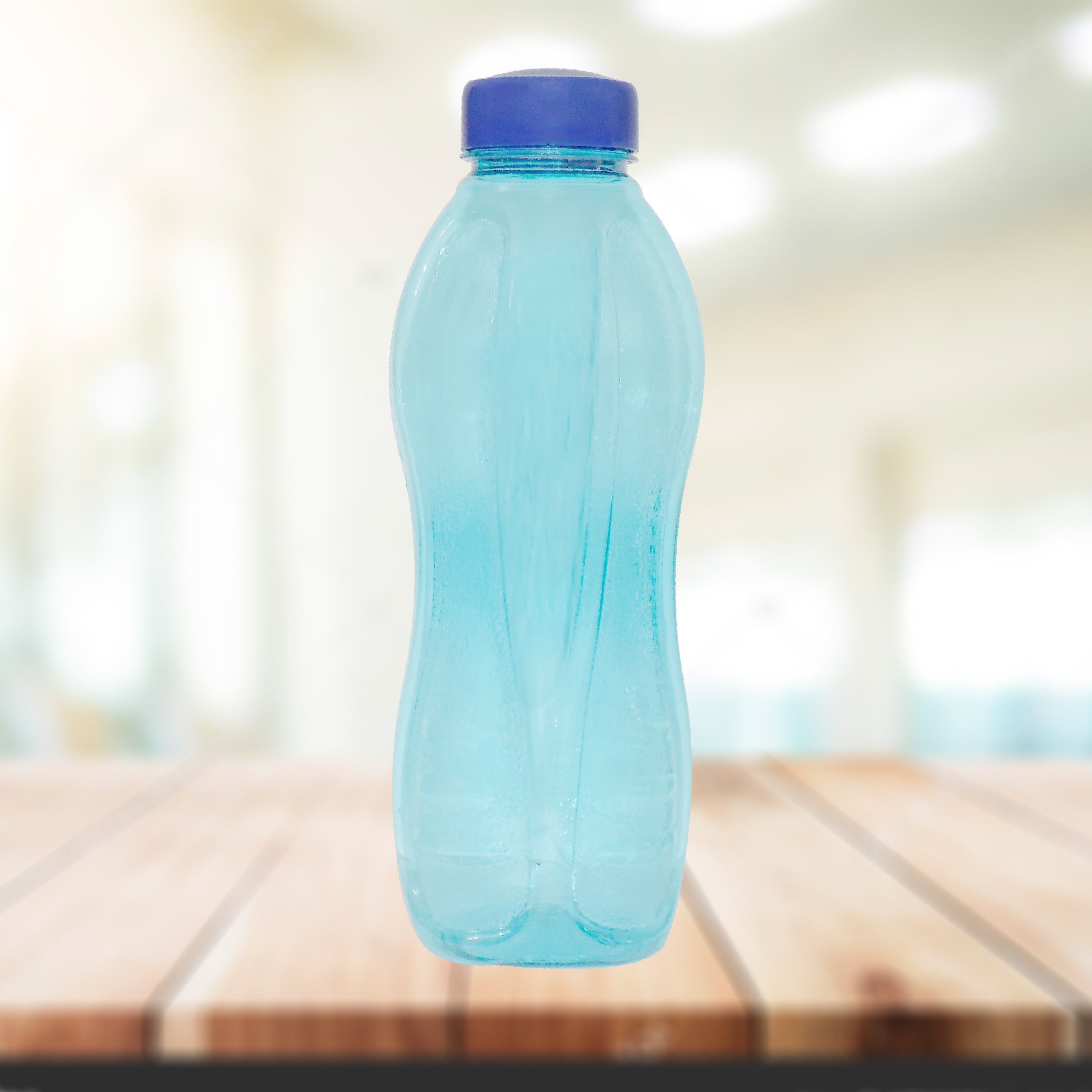 Plastic water bottle with a screw-on lid.