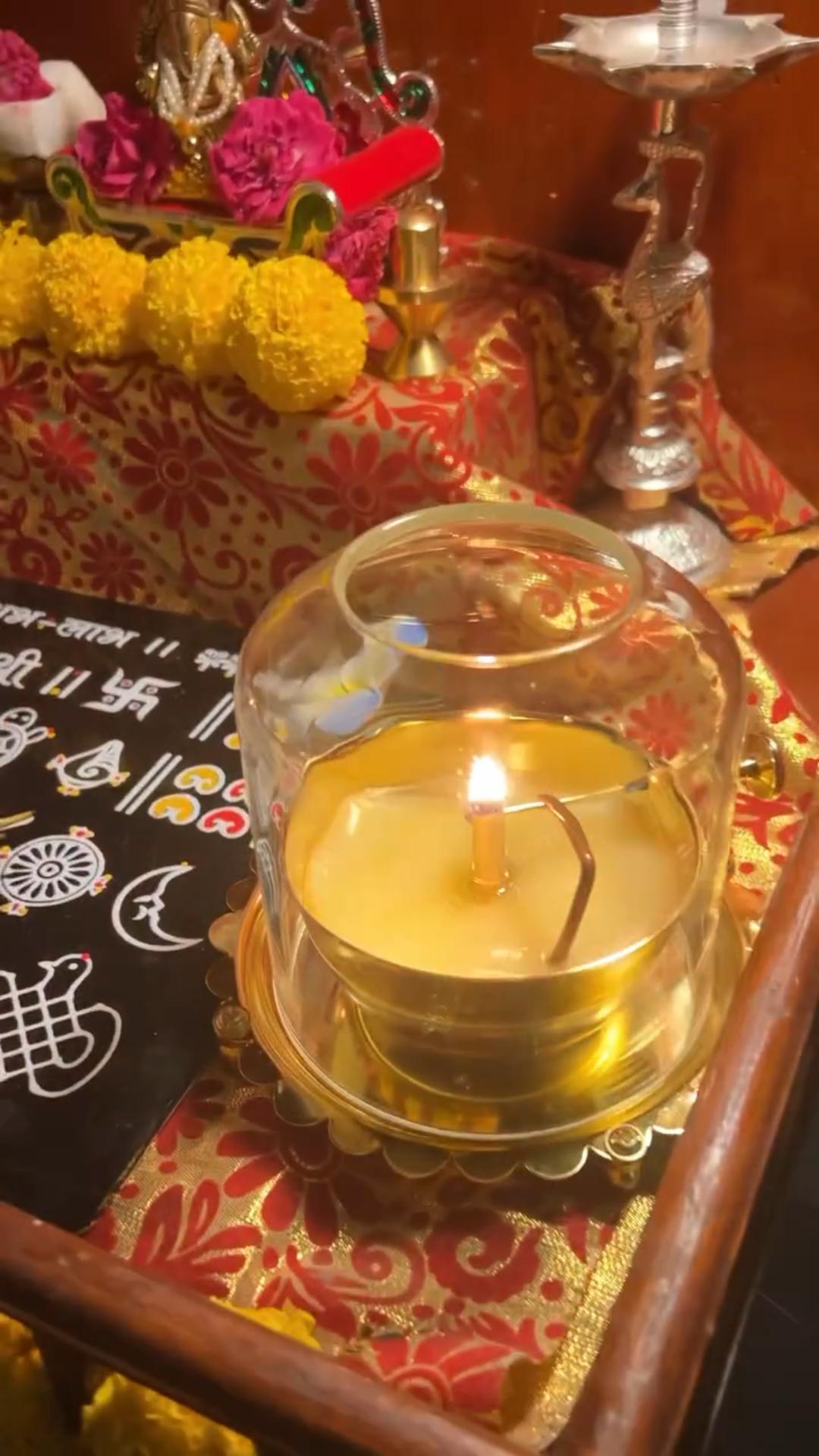 Akhand Jyoti Diya with a built-in wick lifter for easy adjustment during rituals.